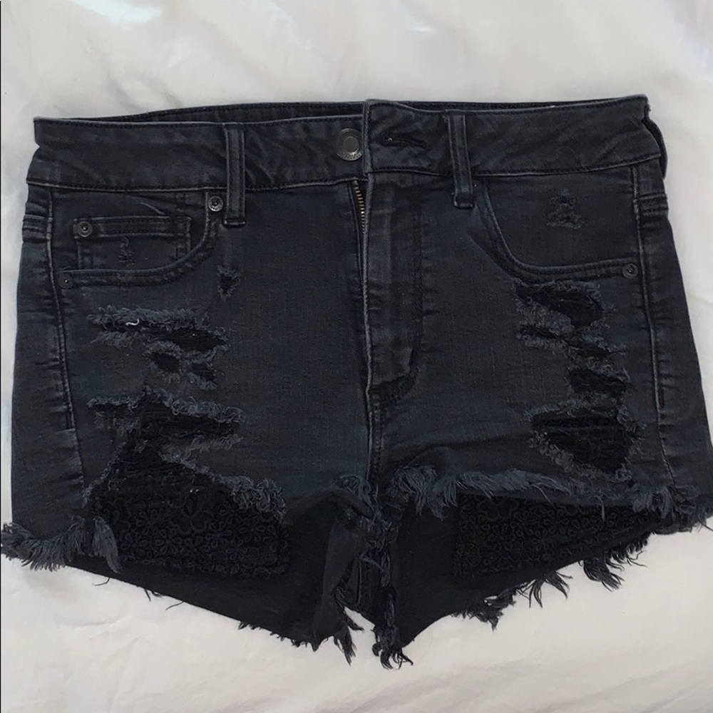 distressed black AE shorts